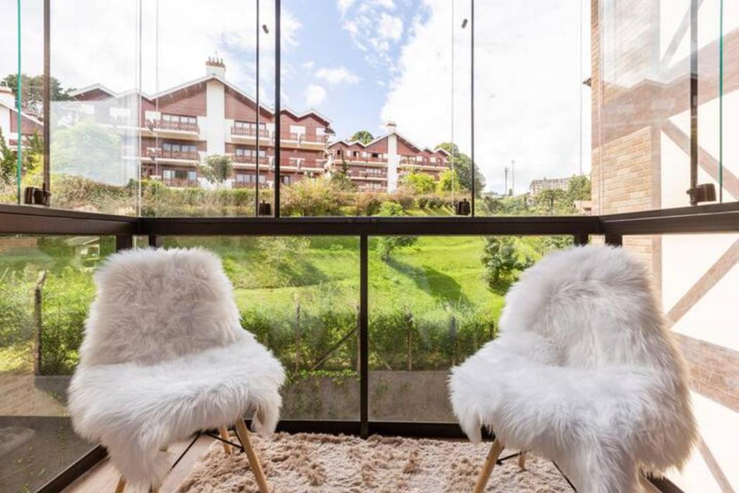Nosso Loft Encantador Em กังโปสดูจอร์เดา ภายนอก รูปภาพ