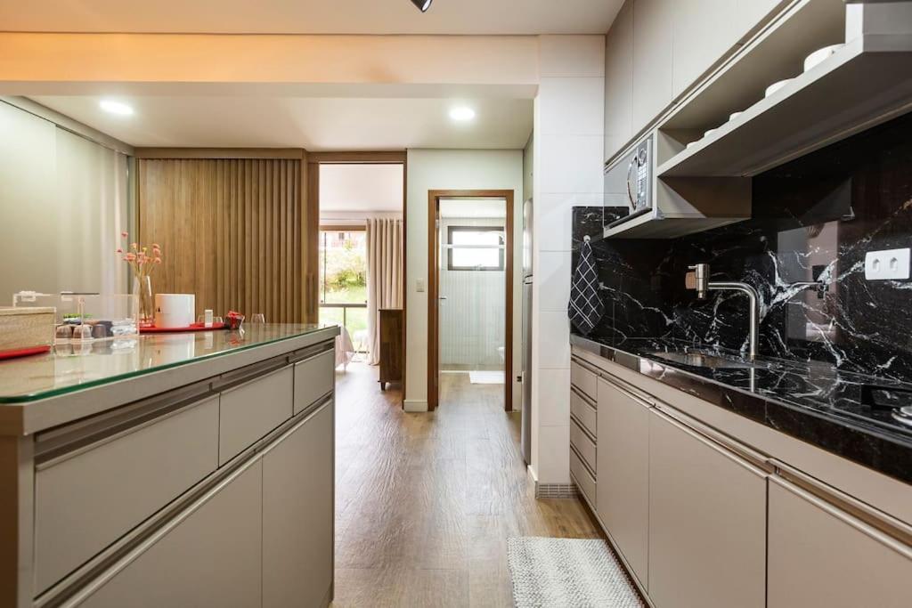 Nosso Loft Encantador Em กังโปสดูจอร์เดา ภายนอก รูปภาพ