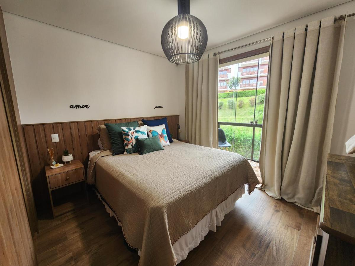 Nosso Loft Encantador Em กังโปสดูจอร์เดา ภายนอก รูปภาพ