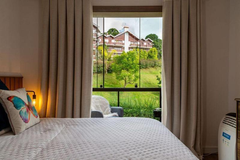 Nosso Loft Encantador Em กังโปสดูจอร์เดา ภายนอก รูปภาพ